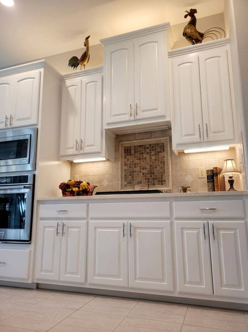 Professionally painted white kitchen cabinets